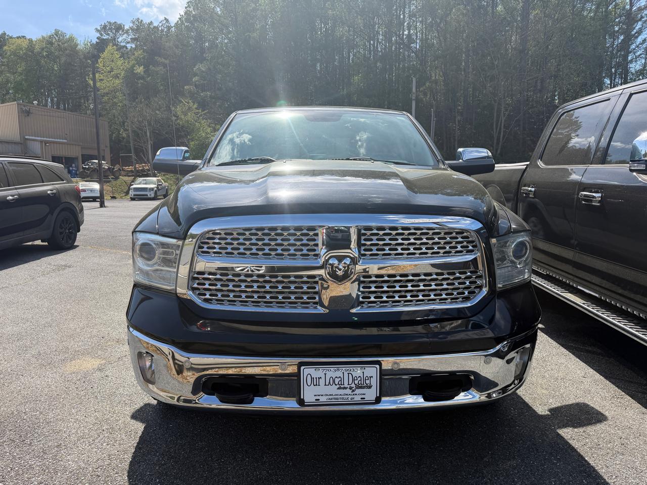 RAM 1500 4WD Quad Cab 140.5" Laramie 2014