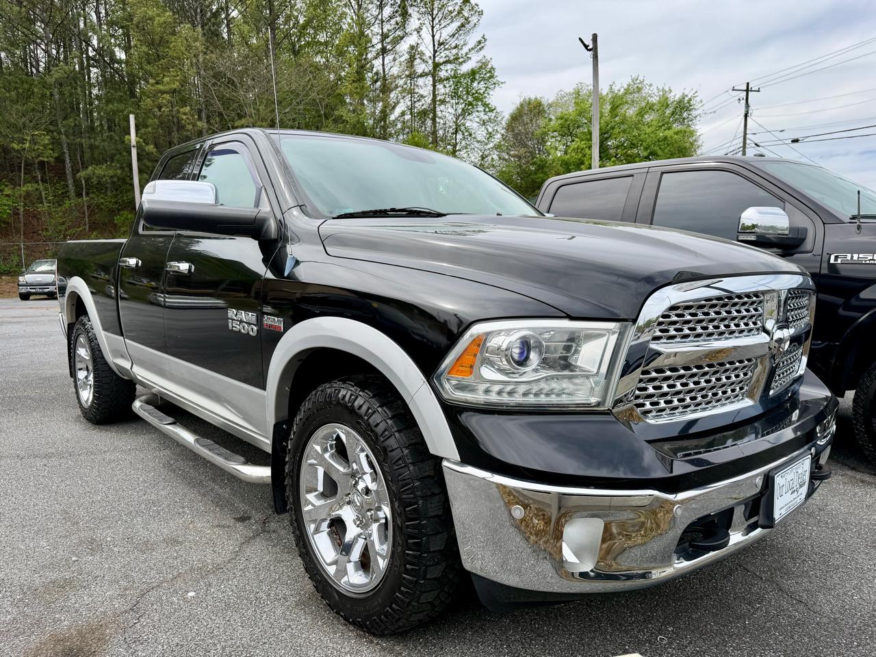 2014 RAM 1500 4WD Quad Cab 140.5" Laramie