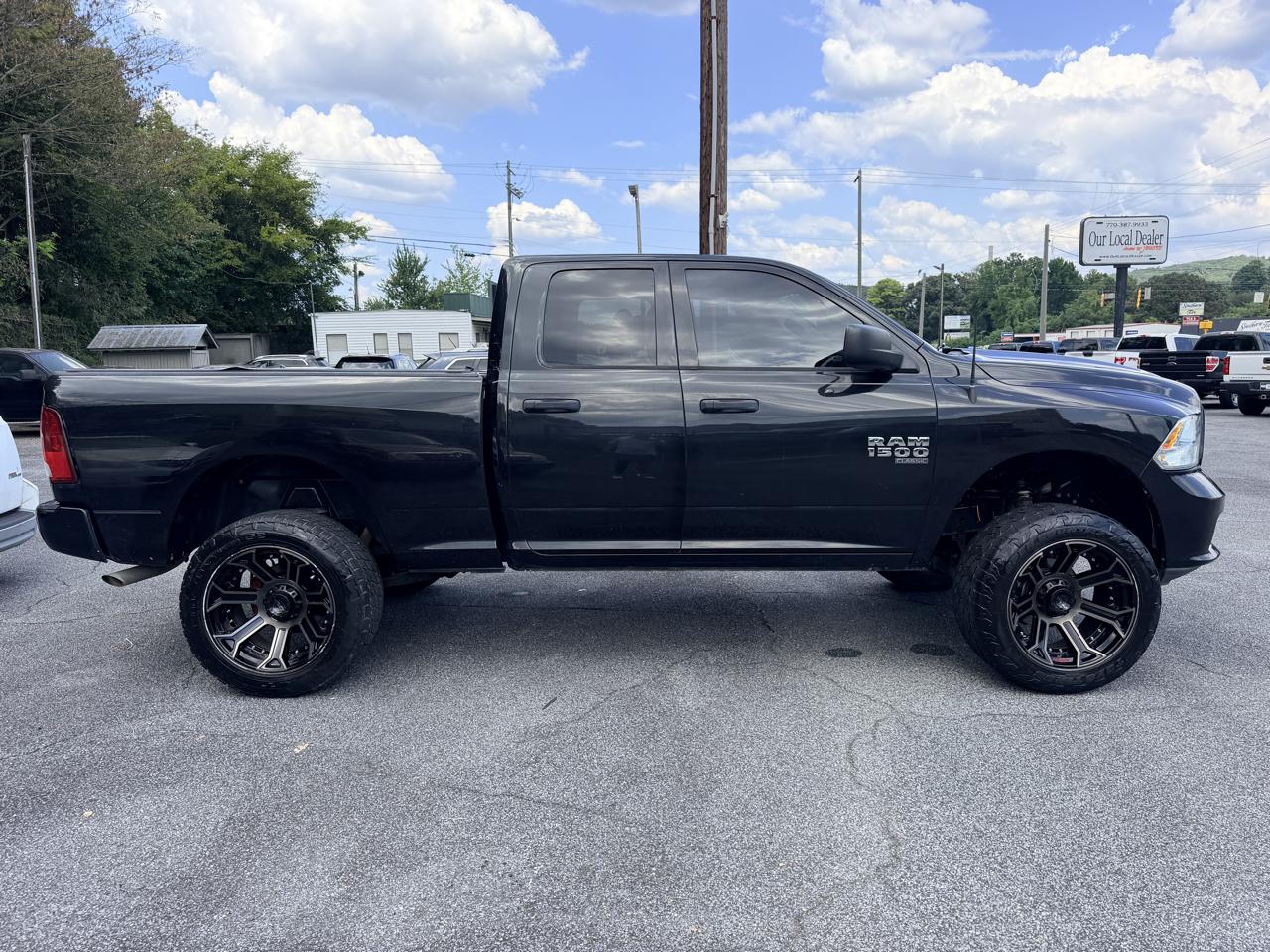 RAM 1500 4WD Quad Cab 140.5" Express 2019
