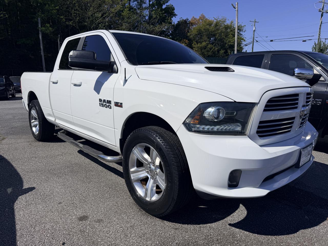 2014 RAM 1500 4WD Quad Cab 140.5" Sport