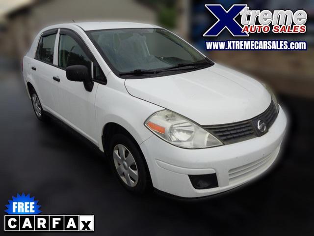 White 2009 Nissan Versa Sedan 5-Speed Manual