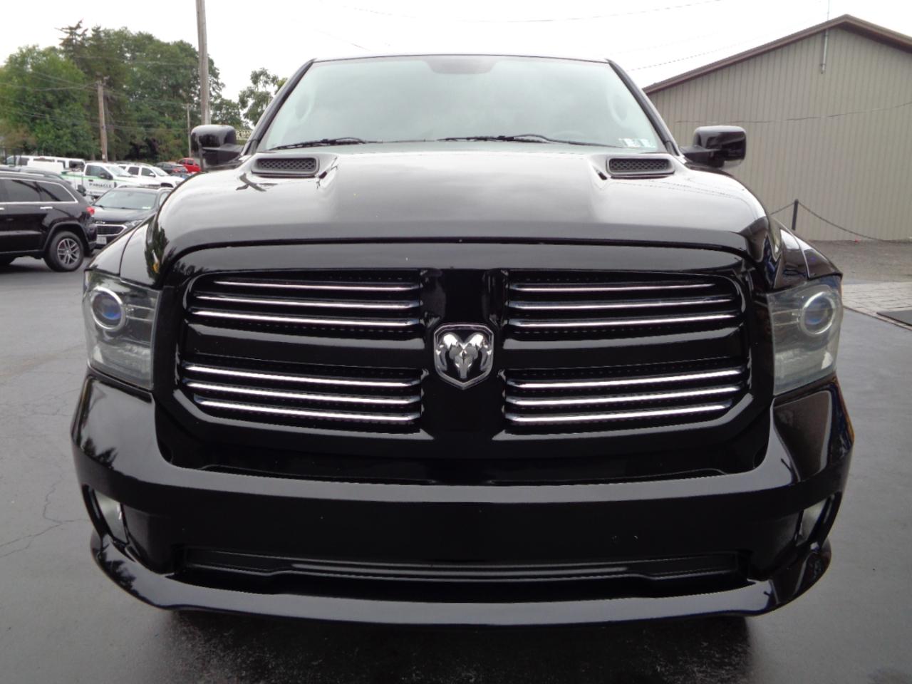 RAM 1500 4WD Quad Cab 140.5" Sport 2014