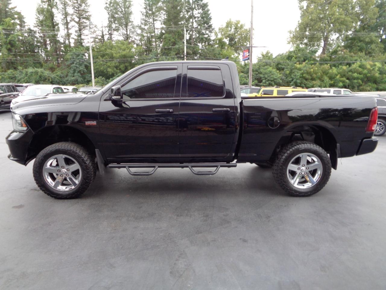 RAM 1500 4WD Quad Cab 140.5" Sport 2014