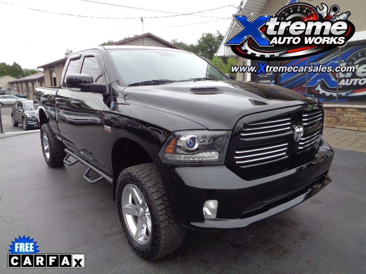 RAM 1500 4WD Quad Cab 140.5" Sport 2014