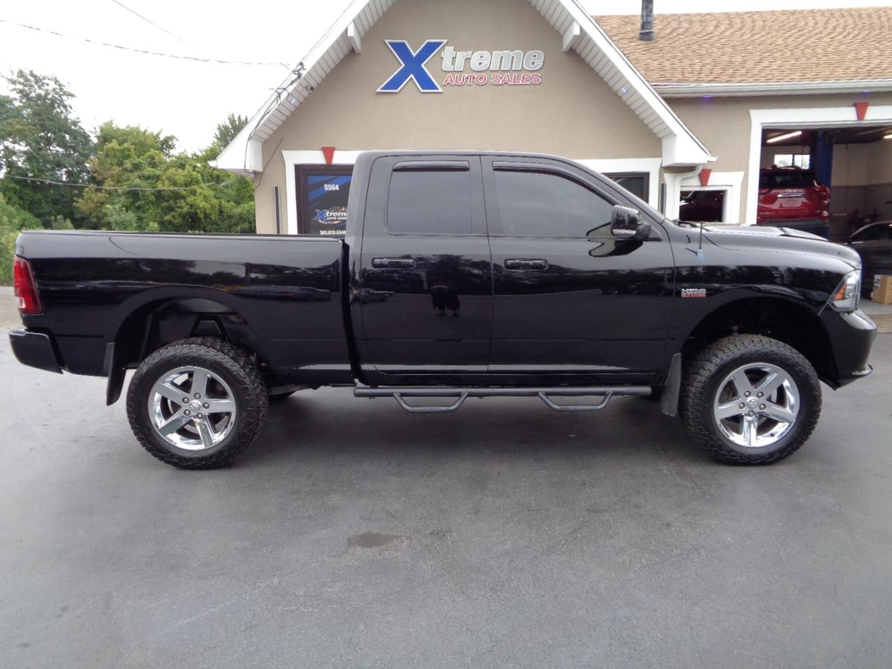RAM 1500 4WD Quad Cab 140.5" Sport 2014