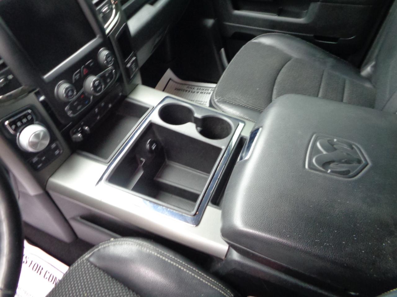 RAM 1500 4WD Quad Cab 140.5" Sport 2014