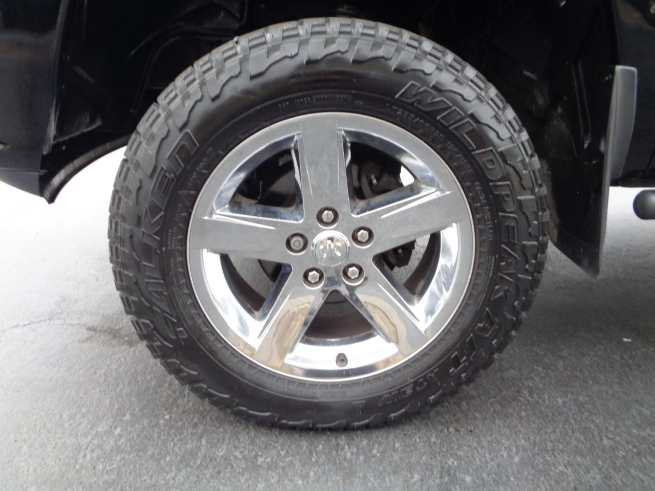 RAM 1500 4WD Quad Cab 140.5" Sport 2014