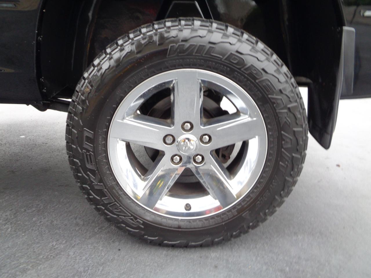 RAM 1500 4WD Quad Cab 140.5" Sport 2014
