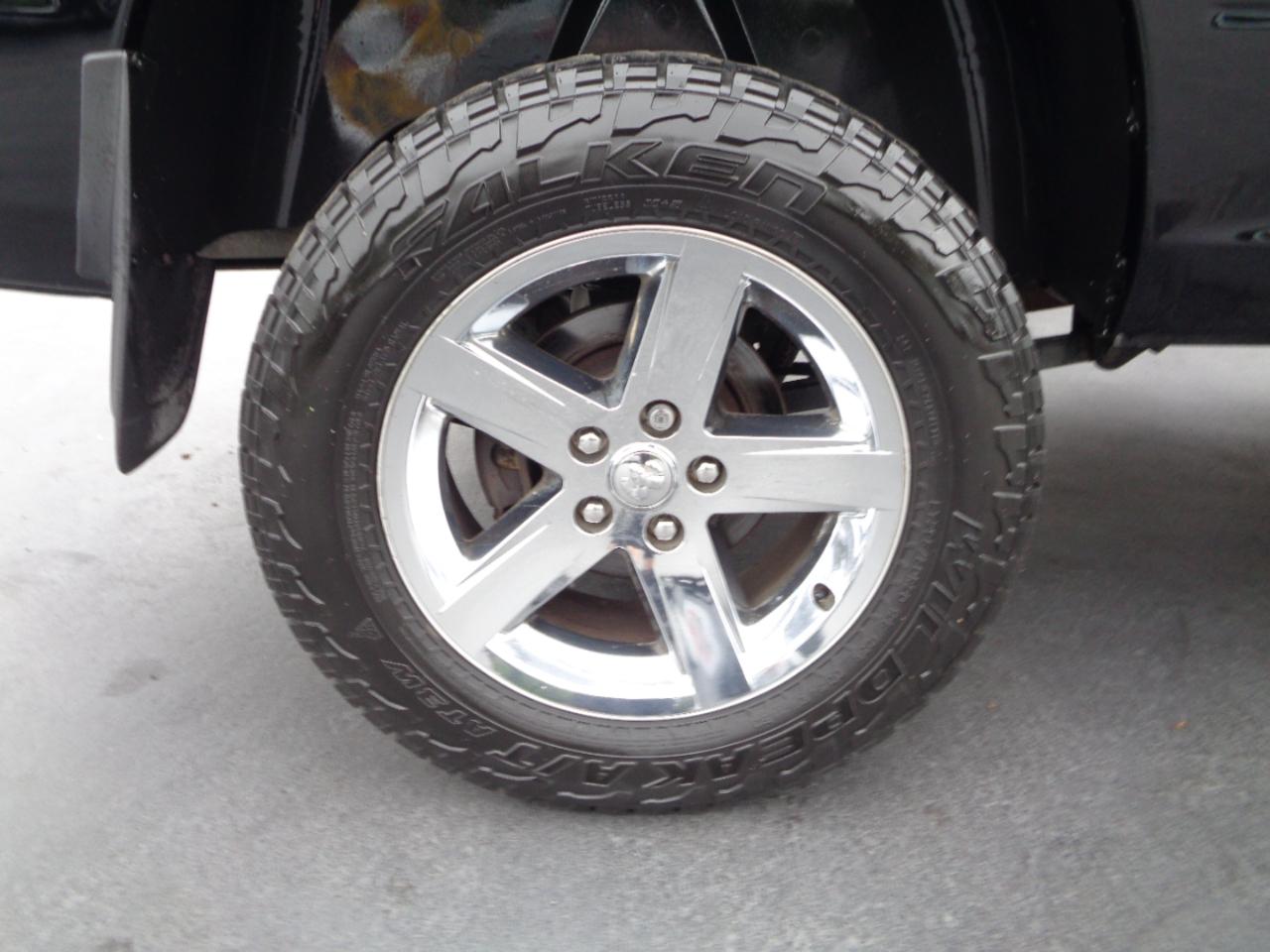 RAM 1500 4WD Quad Cab 140.5" Sport 2014