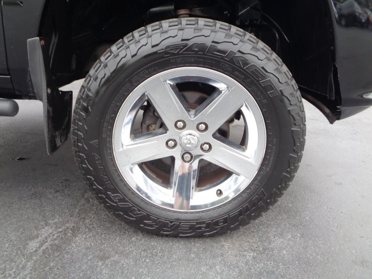 RAM 1500 4WD Quad Cab 140.5" Sport 2014
