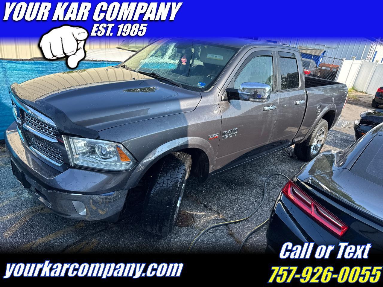 RAM 1500 4WD Quad Cab 140.5" Laramie 2016