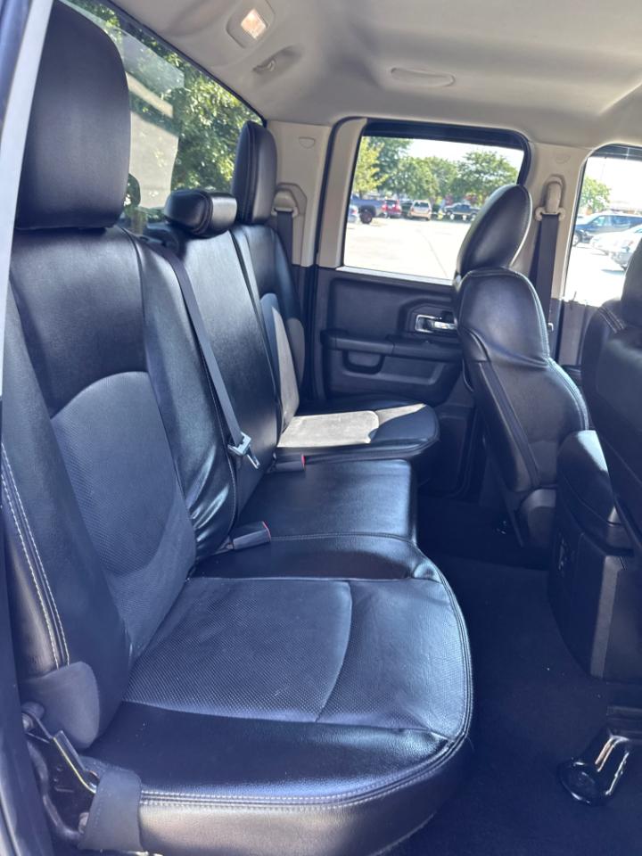 RAM 1500 4WD Quad Cab 140.5" Laramie 2016
