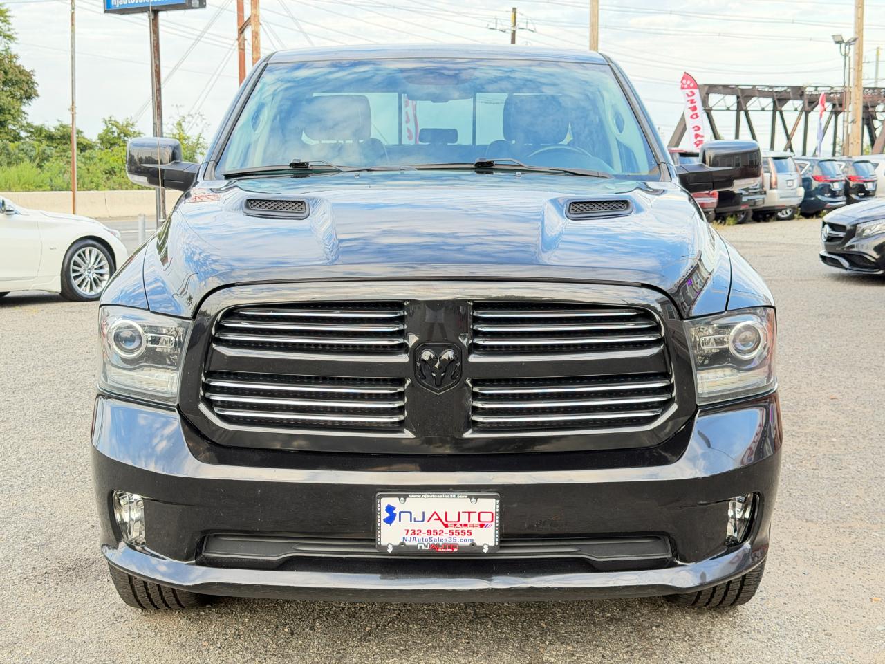 RAM 1500 4WD Crew Cab 140.5" Sport 2016