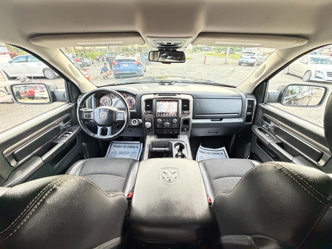 RAM 1500 4WD Crew Cab 140.5" Sport 2016