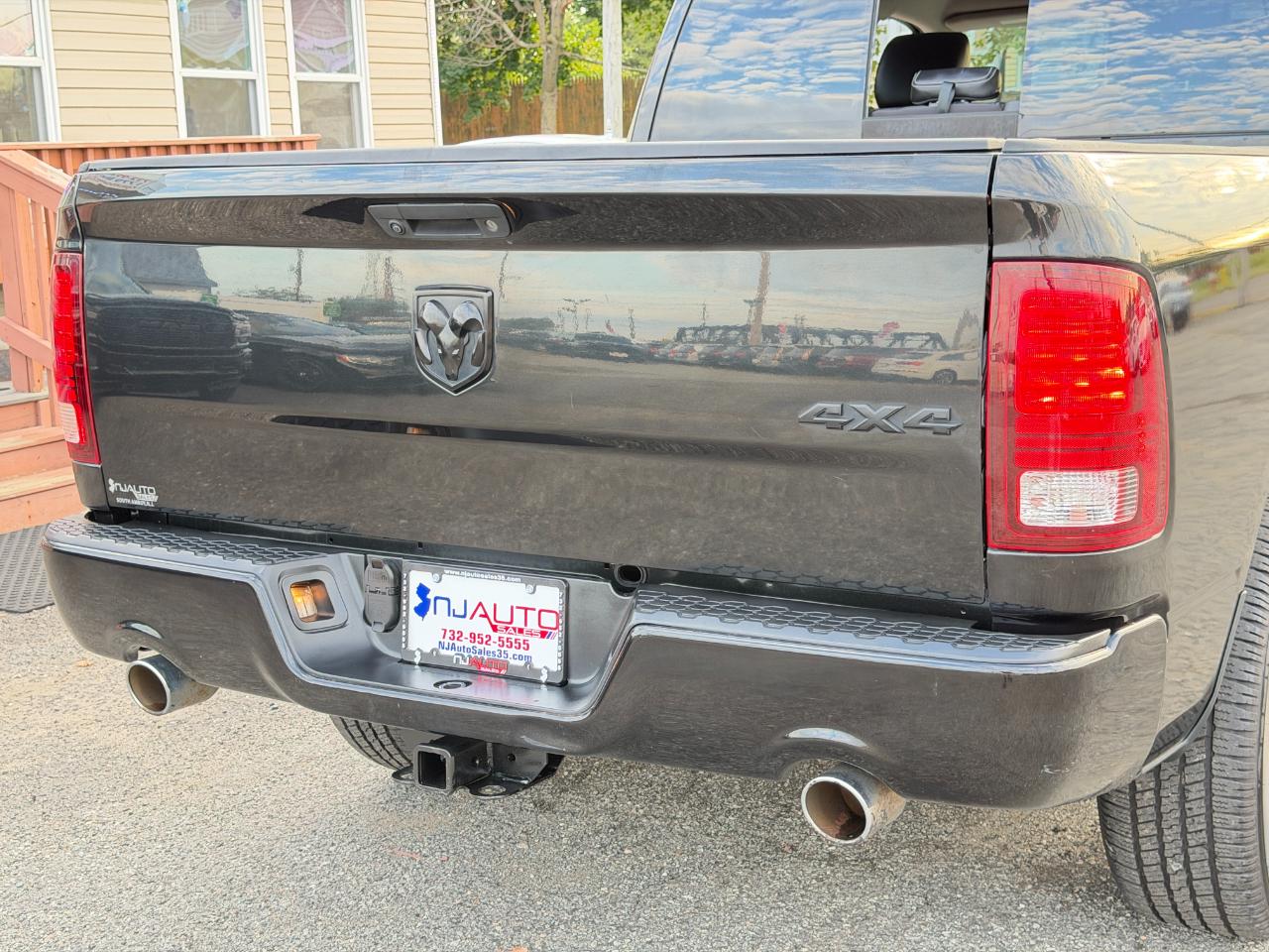 RAM 1500 4WD Crew Cab 140.5" Sport 2016