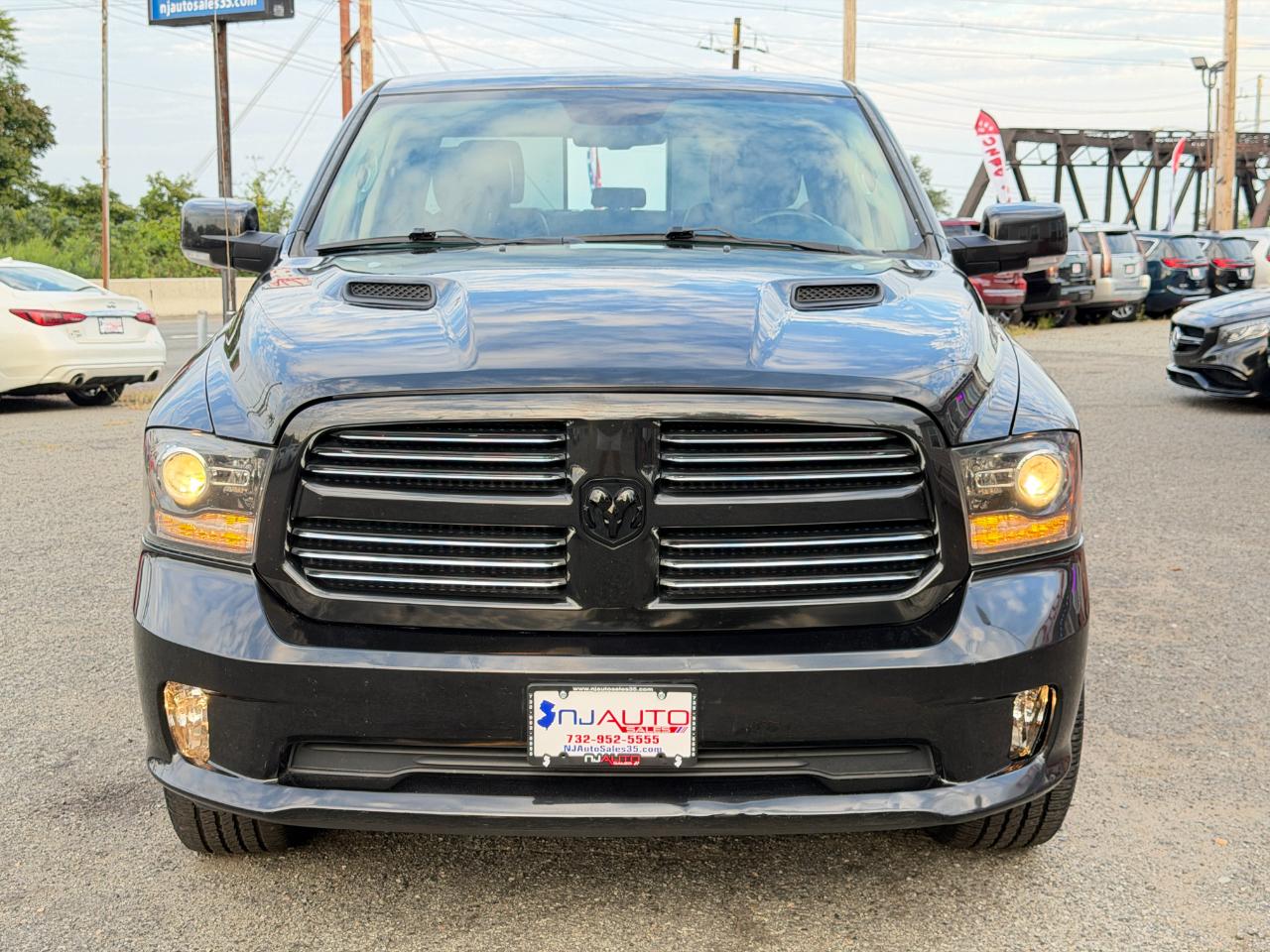 RAM 1500 4WD Crew Cab 140.5" Sport 2016