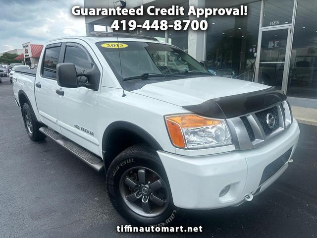 White 2015 Nissan Titan Pickup Truck Four-Wheel Drive Automatic