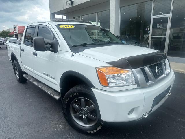 White 2015 Nissan Titan Pickup Truck Four-Wheel Drive Automatic