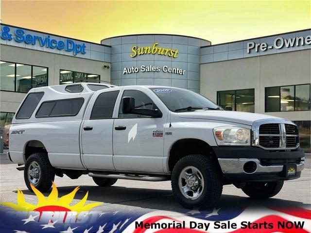 White 2009 Dodge RAM 2500 SXT Quad Cab LB 4WD Pickup Truck Four-Wheel Drive Automatic