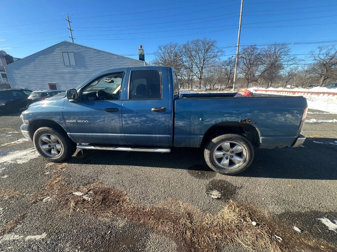 Dodge Ram 1500 4dr Quad Cab 140.5" WB 4WD SLT 2004
