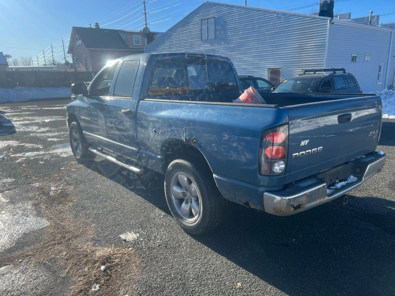 Dodge Ram 1500 4dr Quad Cab 140.5" WB 4WD SLT 2004