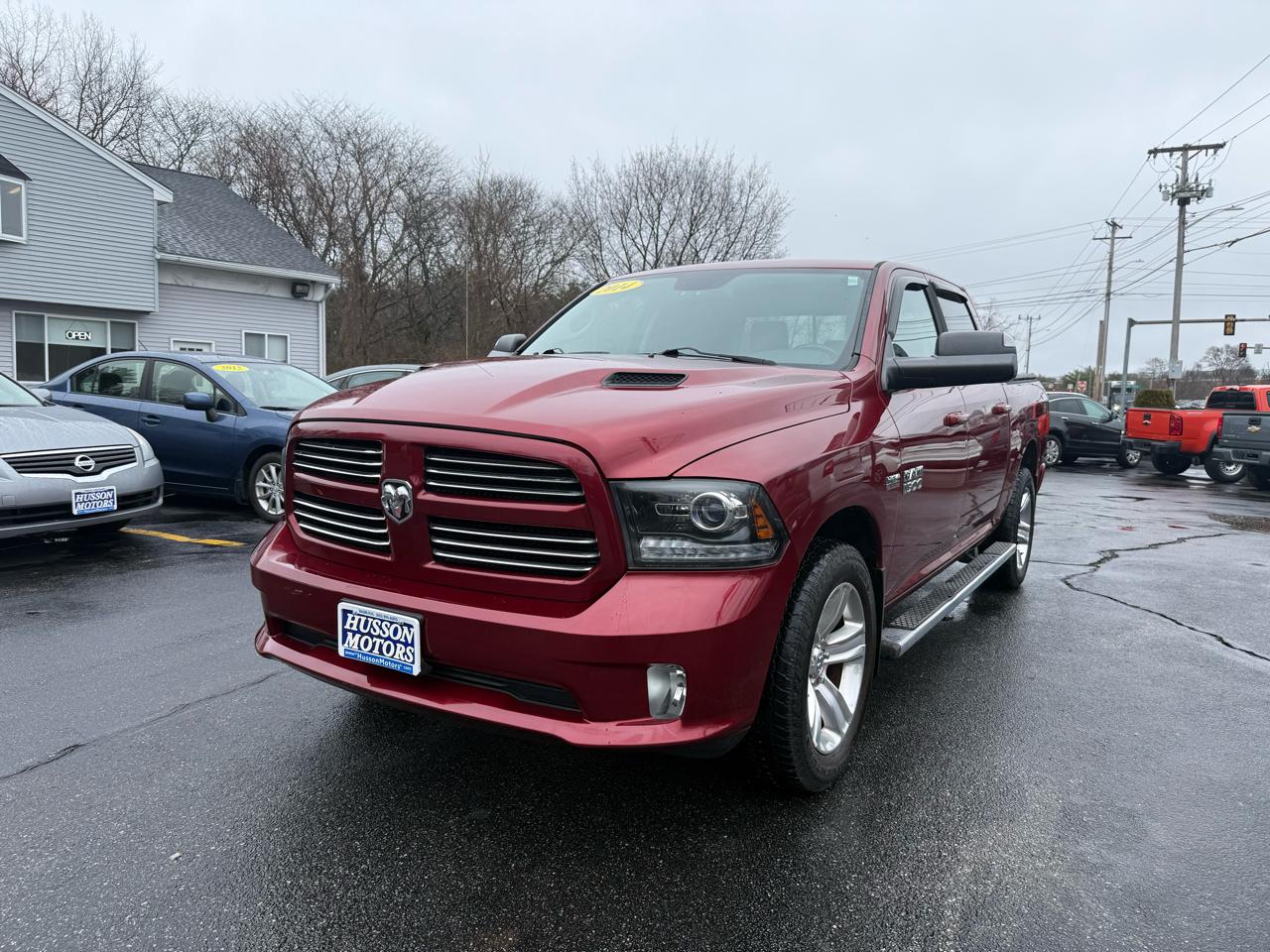 RAM 1500 4WD Crew Cab 140.5" Sport 2014