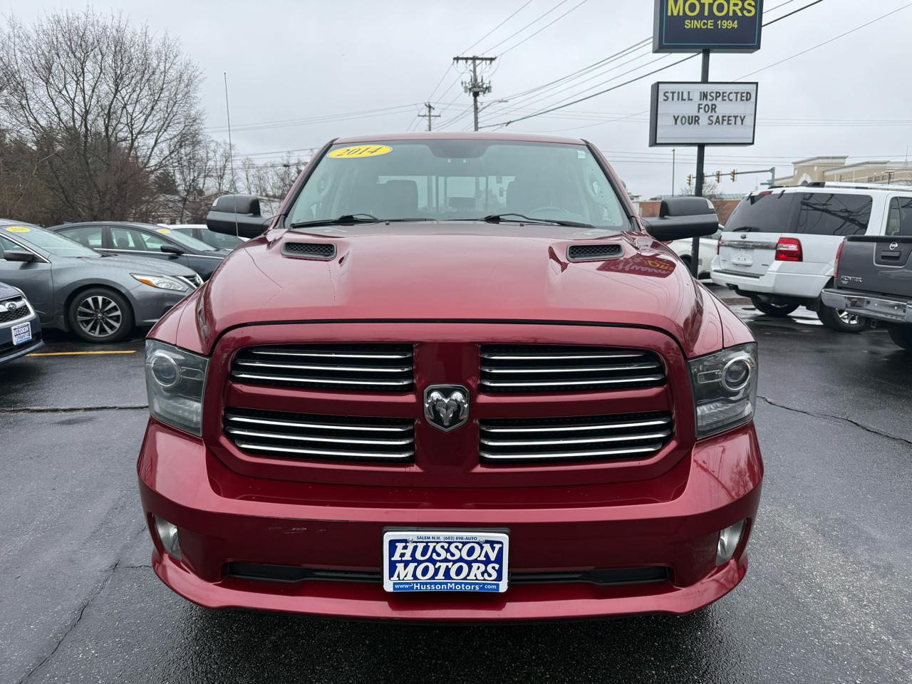 RAM 1500 4WD Crew Cab 140.5" Sport 2014