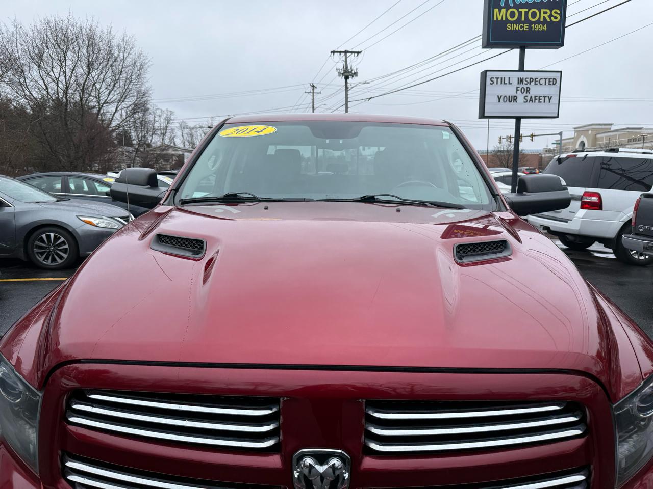RAM 1500 4WD Crew Cab 140.5" Sport 2014