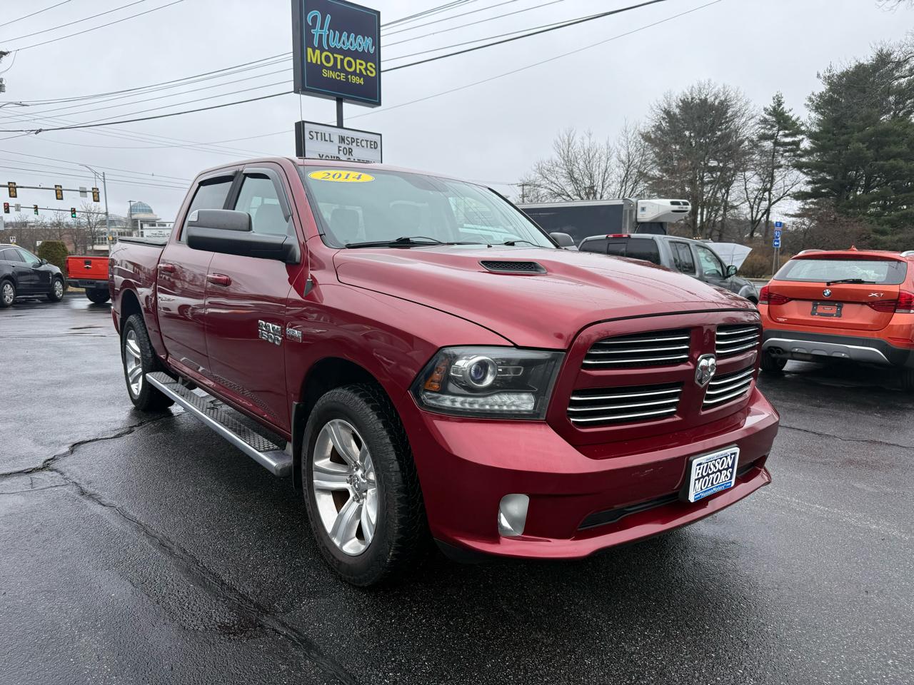 RAM 1500 4WD Crew Cab 140.5" Sport 2014