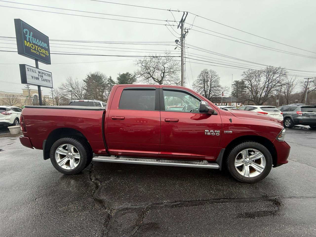 RAM 1500 4WD Crew Cab 140.5" Sport 2014