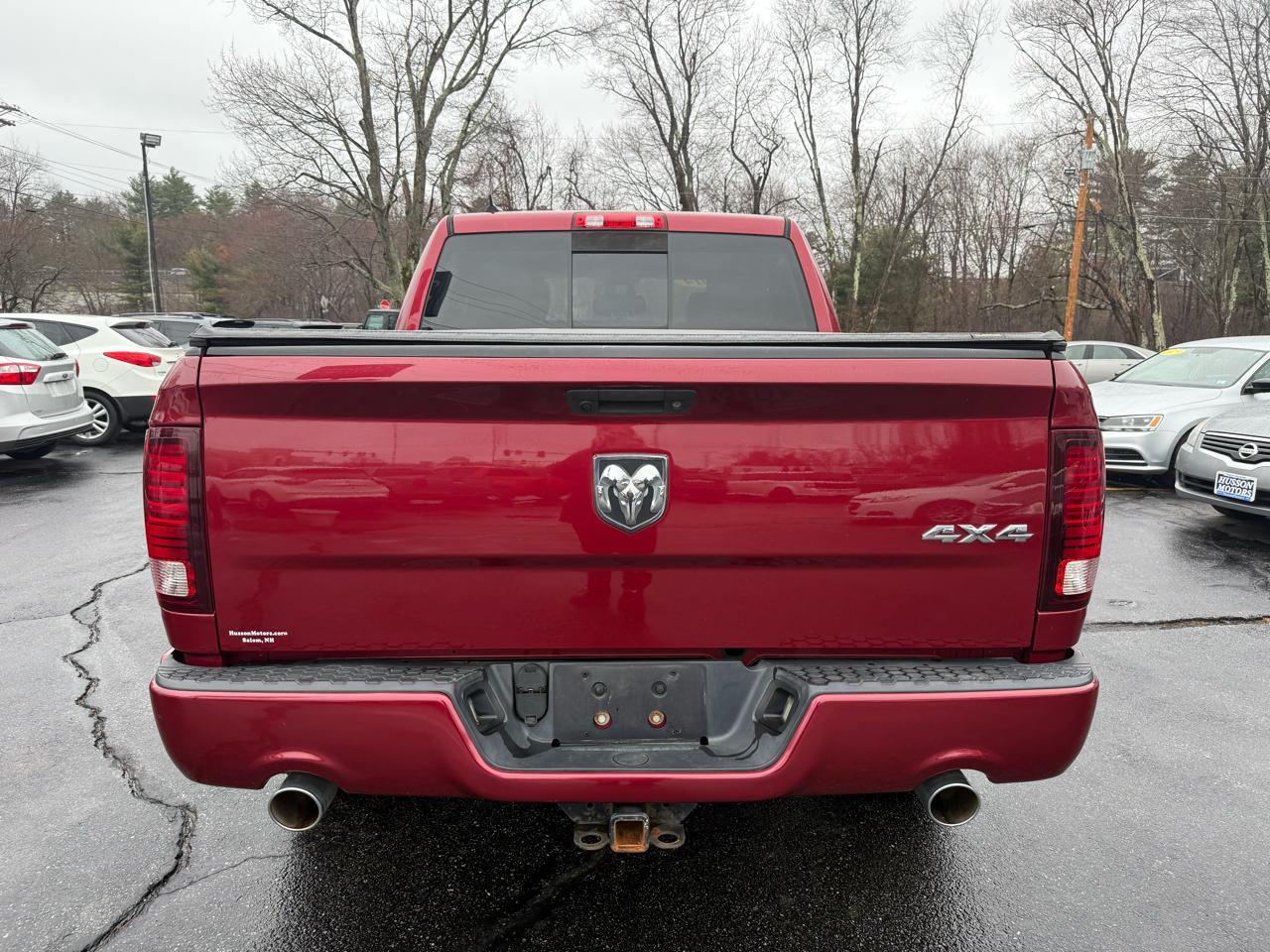 RAM 1500 4WD Crew Cab 140.5" Sport 2014