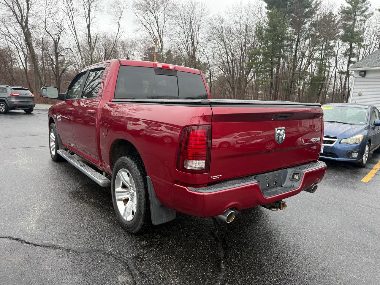 RAM 1500 4WD Crew Cab 140.5" Sport 2014