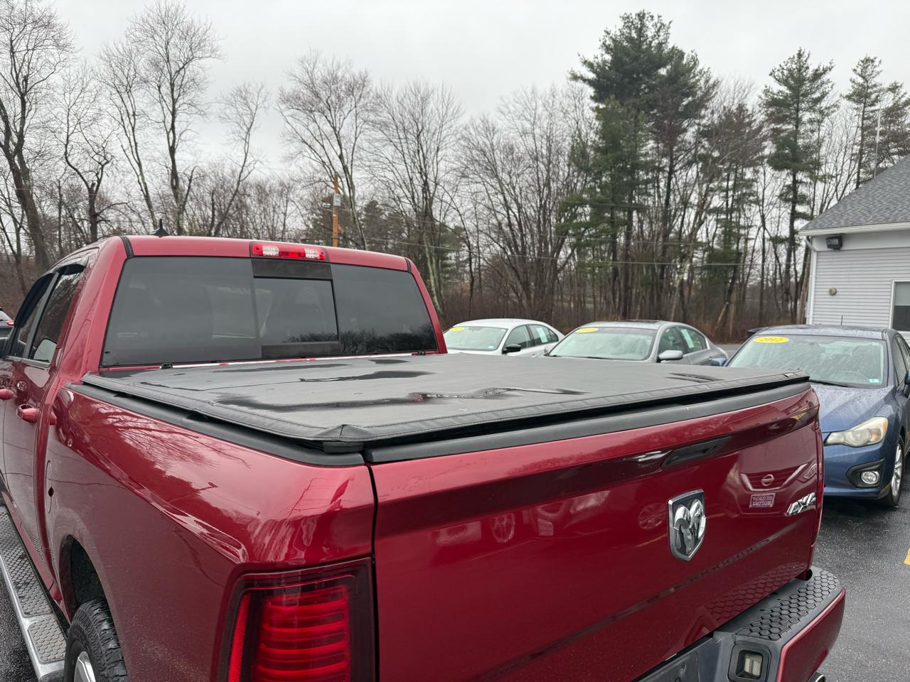 RAM 1500 4WD Crew Cab 140.5" Sport 2014