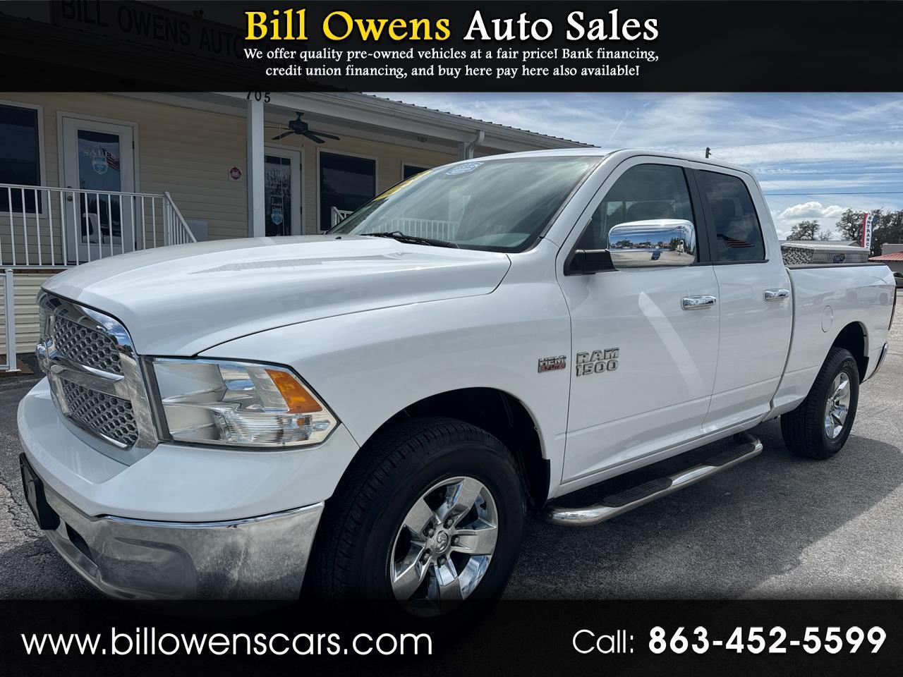 2014 RAM 1500 4WD Quad Cab 140.5" SLT