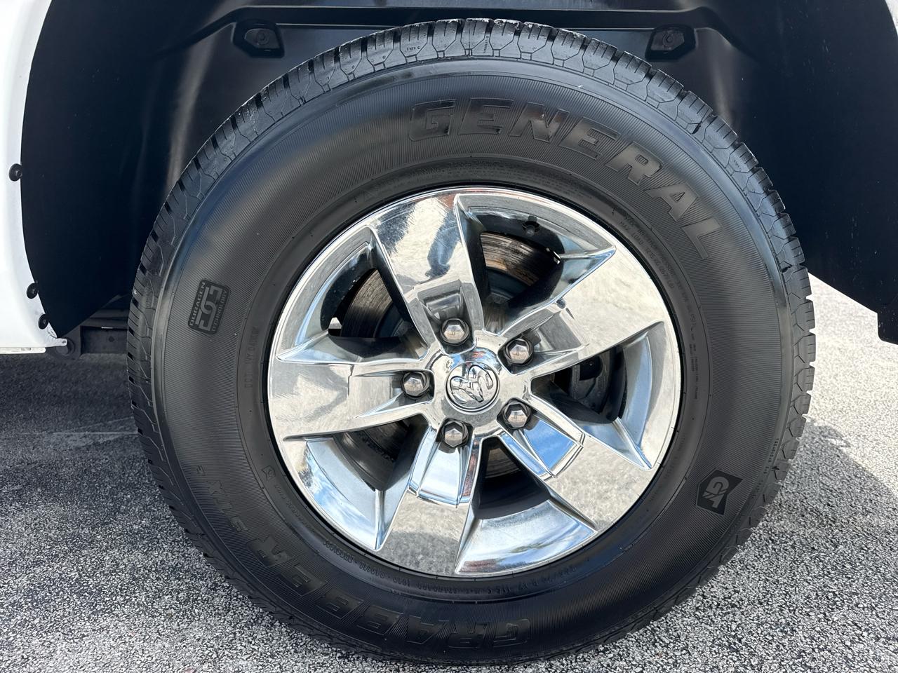 RAM 1500 4WD Quad Cab 140.5" SLT 2014