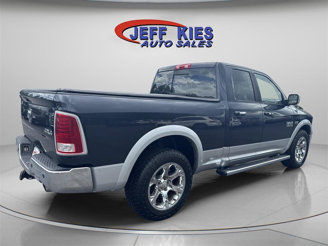 RAM 1500 4WD Quad Cab 140.5" Laramie 2013