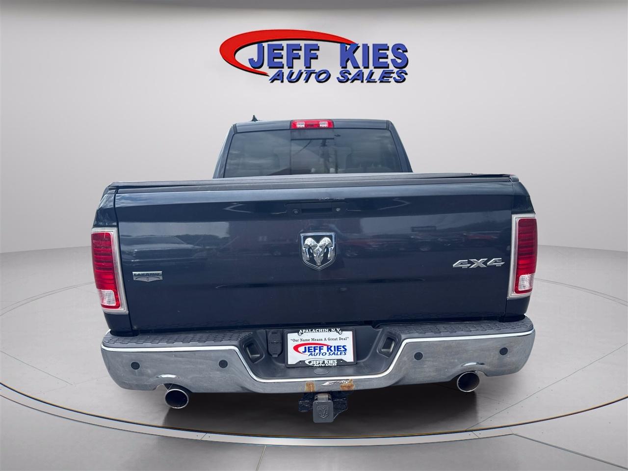 RAM 1500 4WD Quad Cab 140.5" Laramie 2013