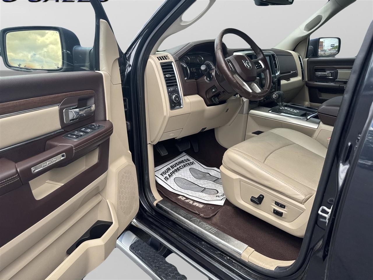 RAM 1500 4WD Quad Cab 140.5" Laramie 2013