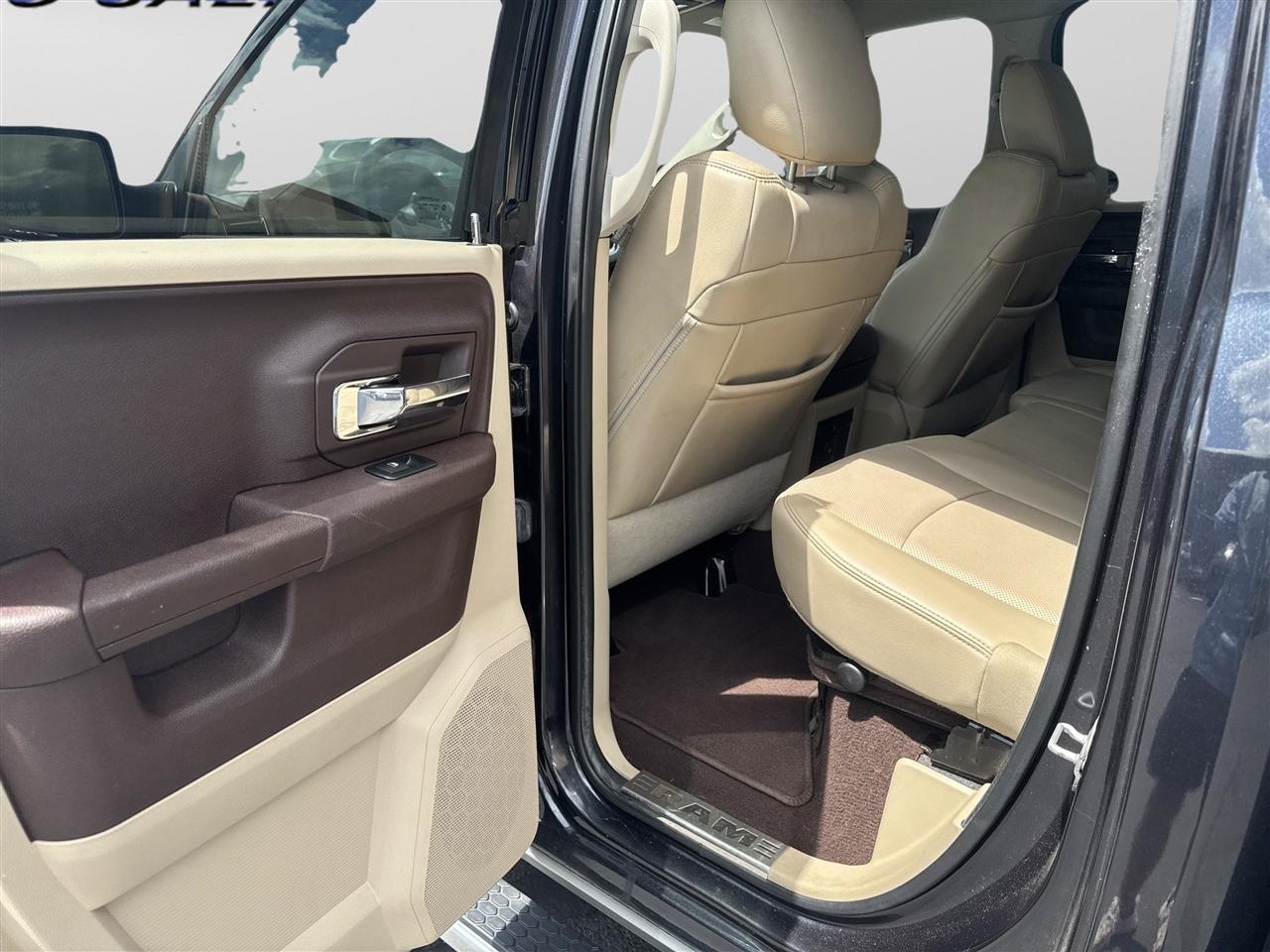 RAM 1500 4WD Quad Cab 140.5" Laramie 2013