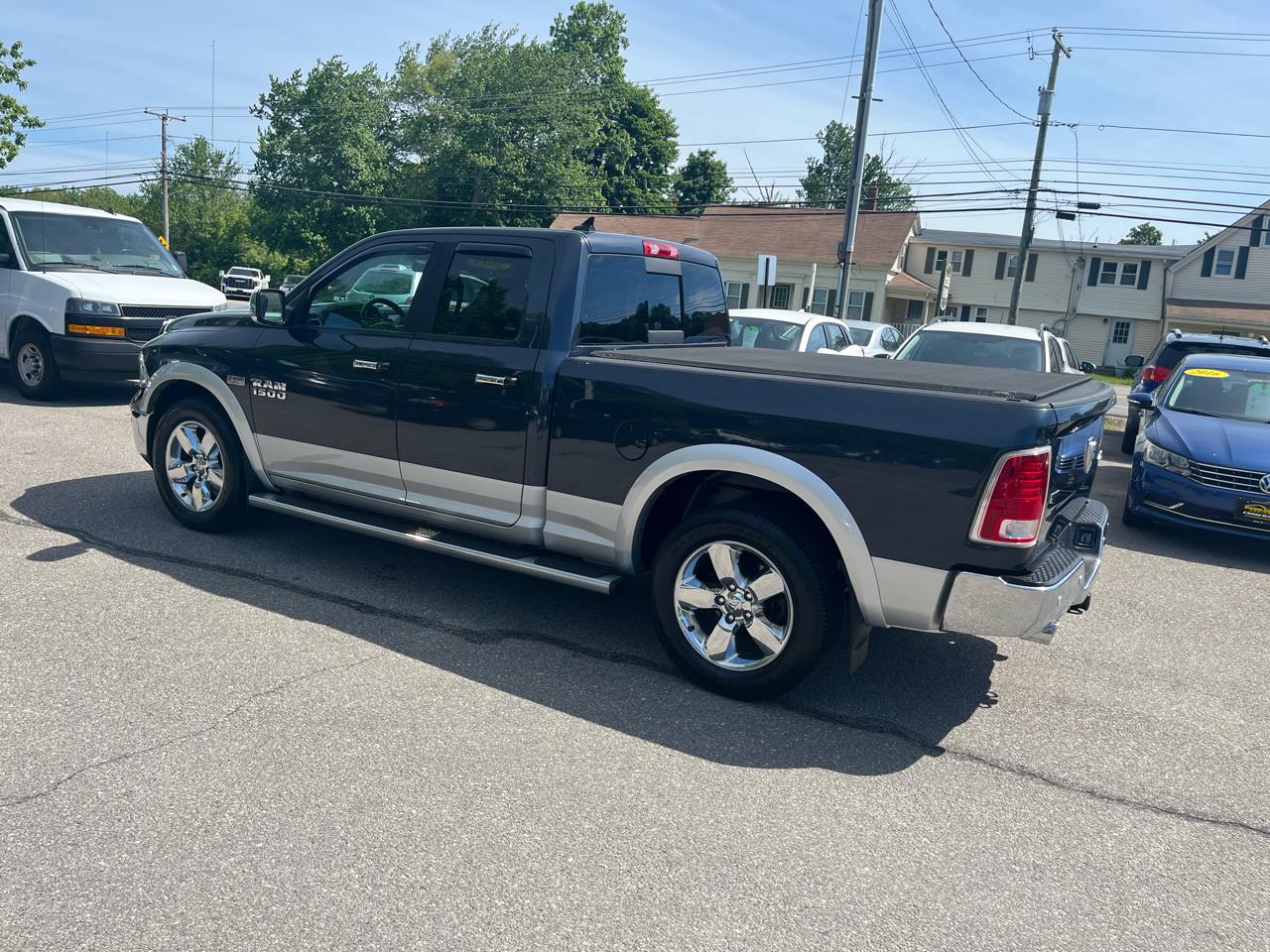 RAM 1500 4WD Quad Cab 140.5" Laramie 2014