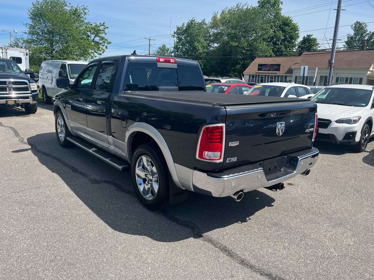 RAM 1500 4WD Quad Cab 140.5" Laramie 2014