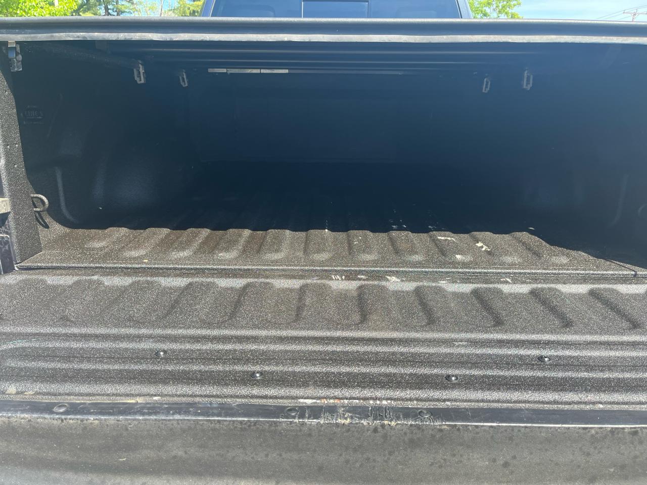 RAM 1500 4WD Quad Cab 140.5" Laramie 2014