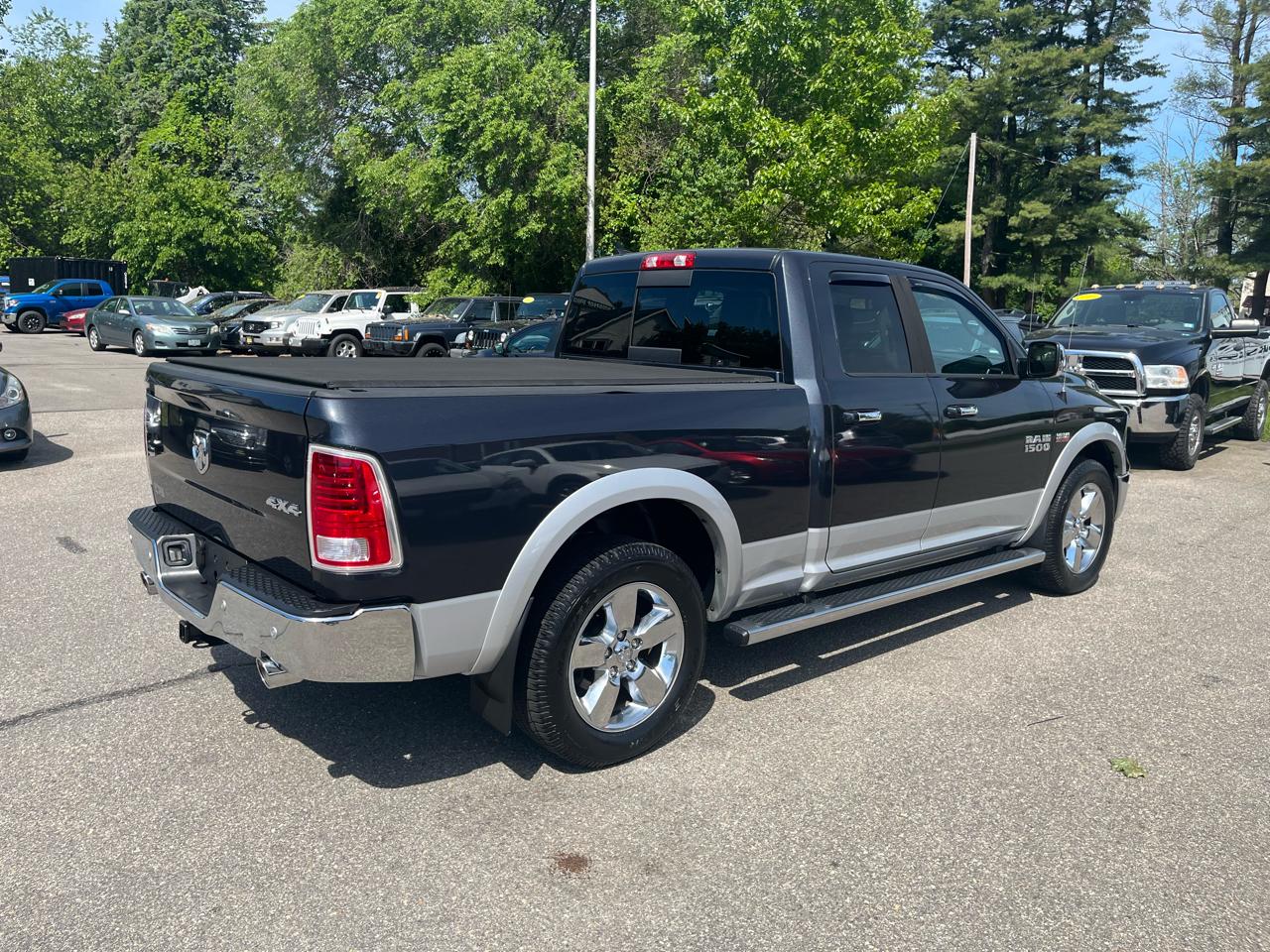 RAM 1500 4WD Quad Cab 140.5" Laramie 2014
