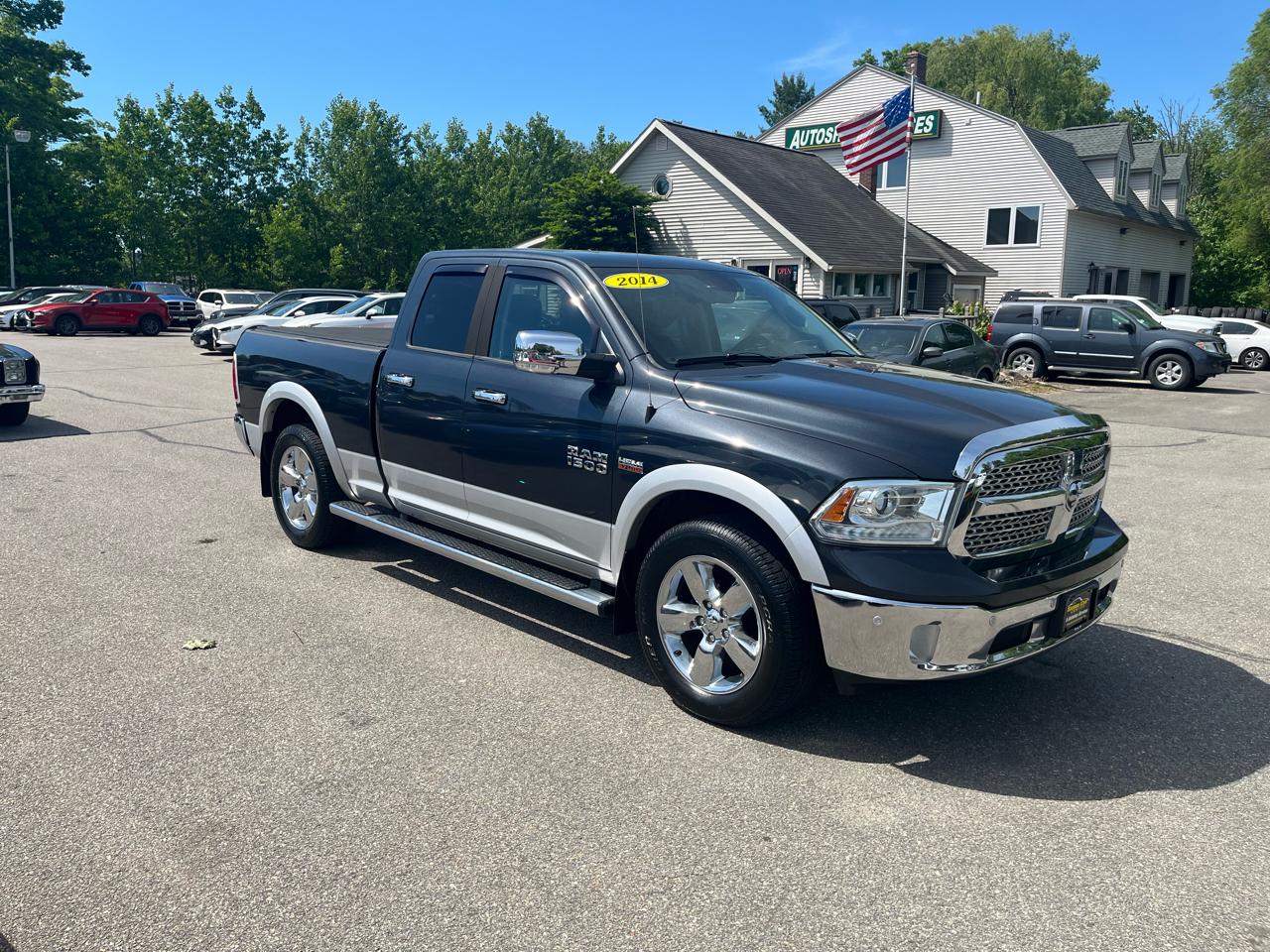 RAM 1500 4WD Quad Cab 140.5" Laramie 2014