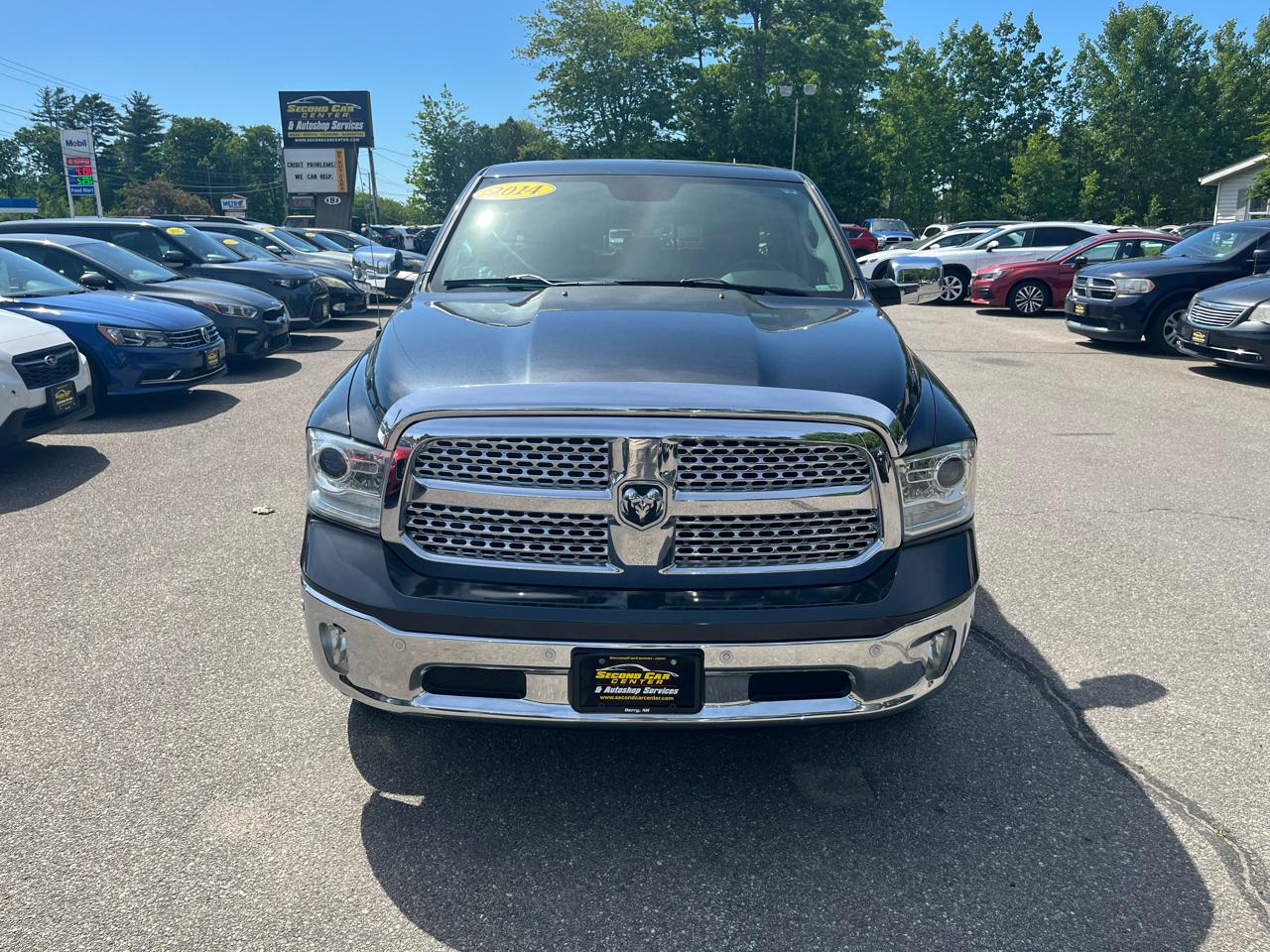 RAM 1500 4WD Quad Cab 140.5" Laramie 2014