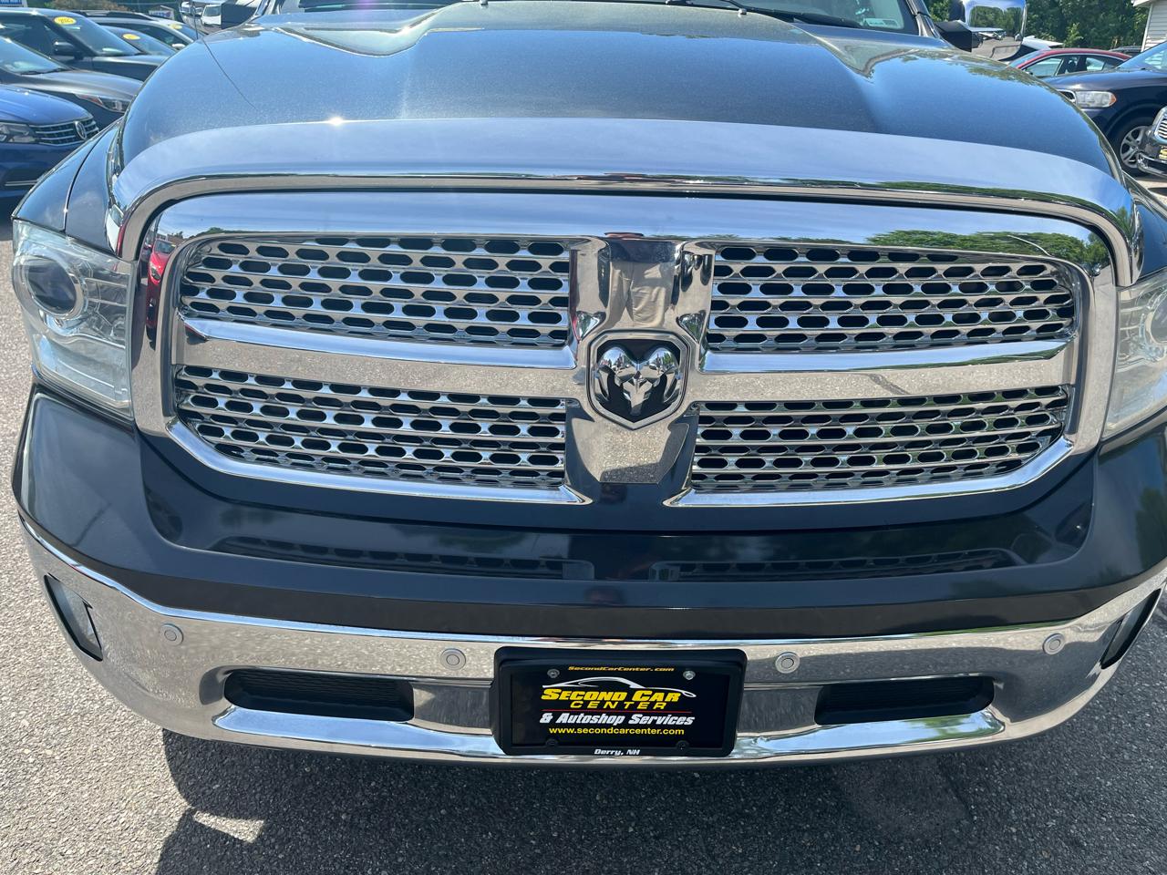 RAM 1500 4WD Quad Cab 140.5" Laramie 2014