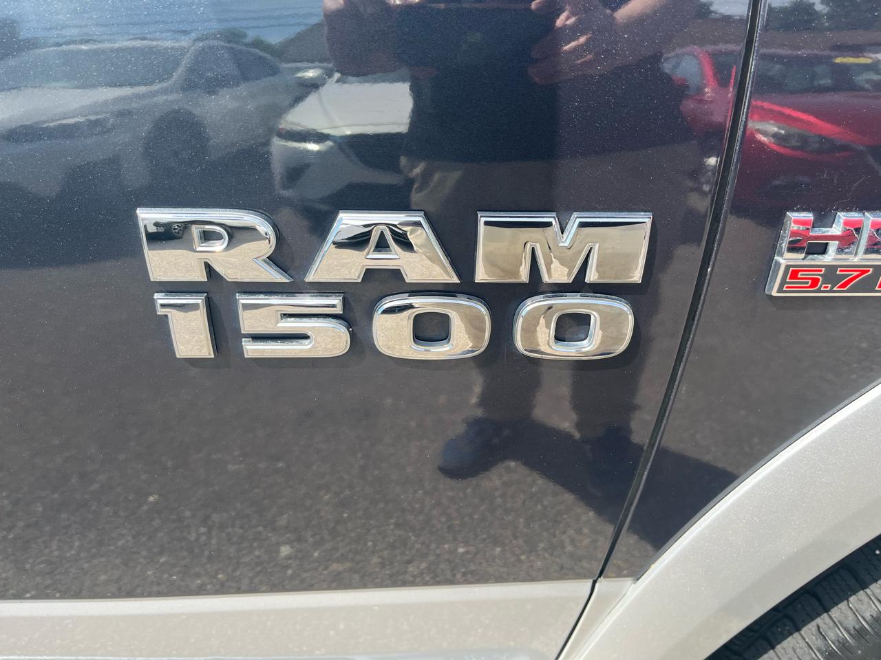 RAM 1500 4WD Quad Cab 140.5" Laramie 2014