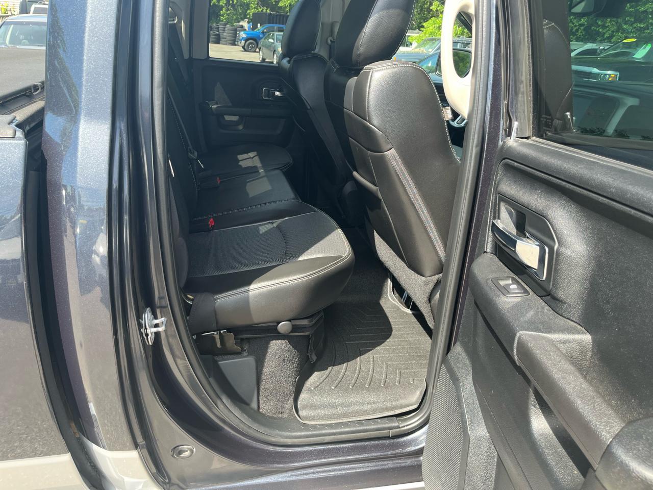 RAM 1500 4WD Quad Cab 140.5" Laramie 2014