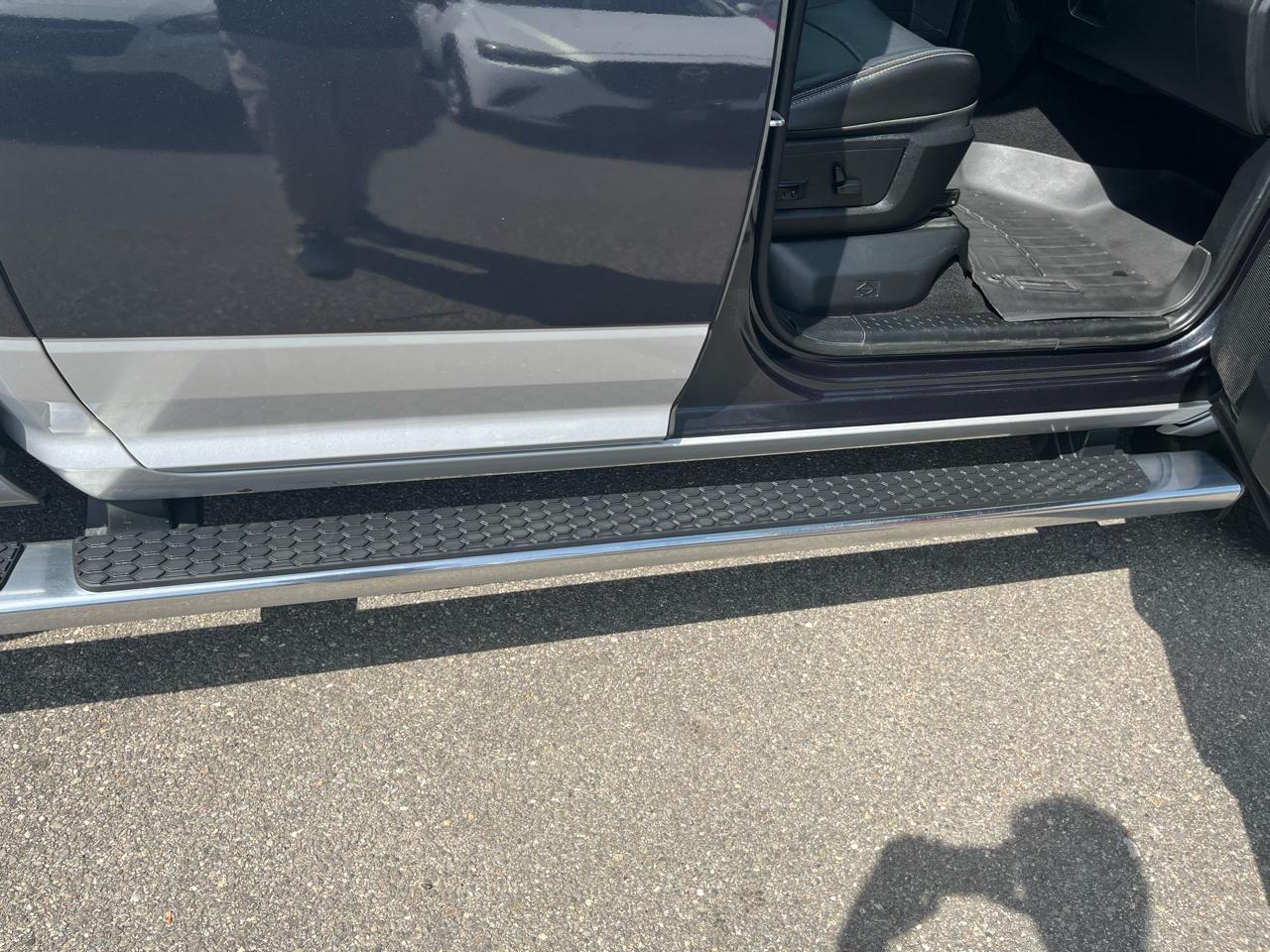 RAM 1500 4WD Quad Cab 140.5" Laramie 2014