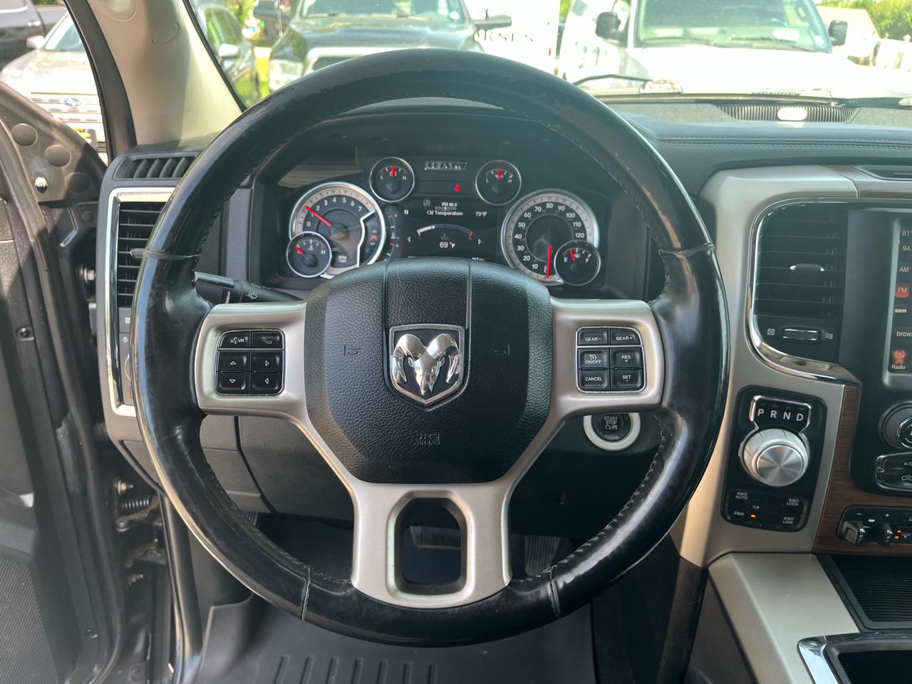 RAM 1500 4WD Quad Cab 140.5" Laramie 2014